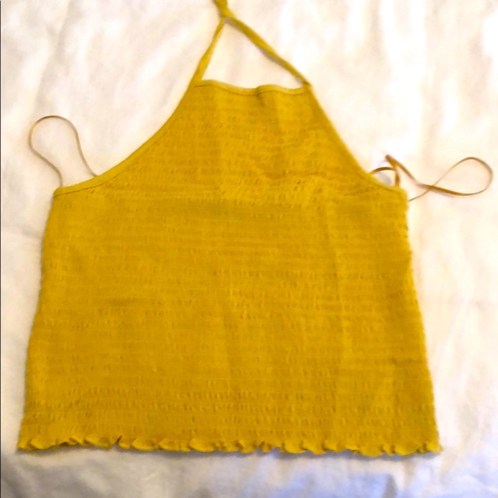 Mustard colored crop top. Stretch